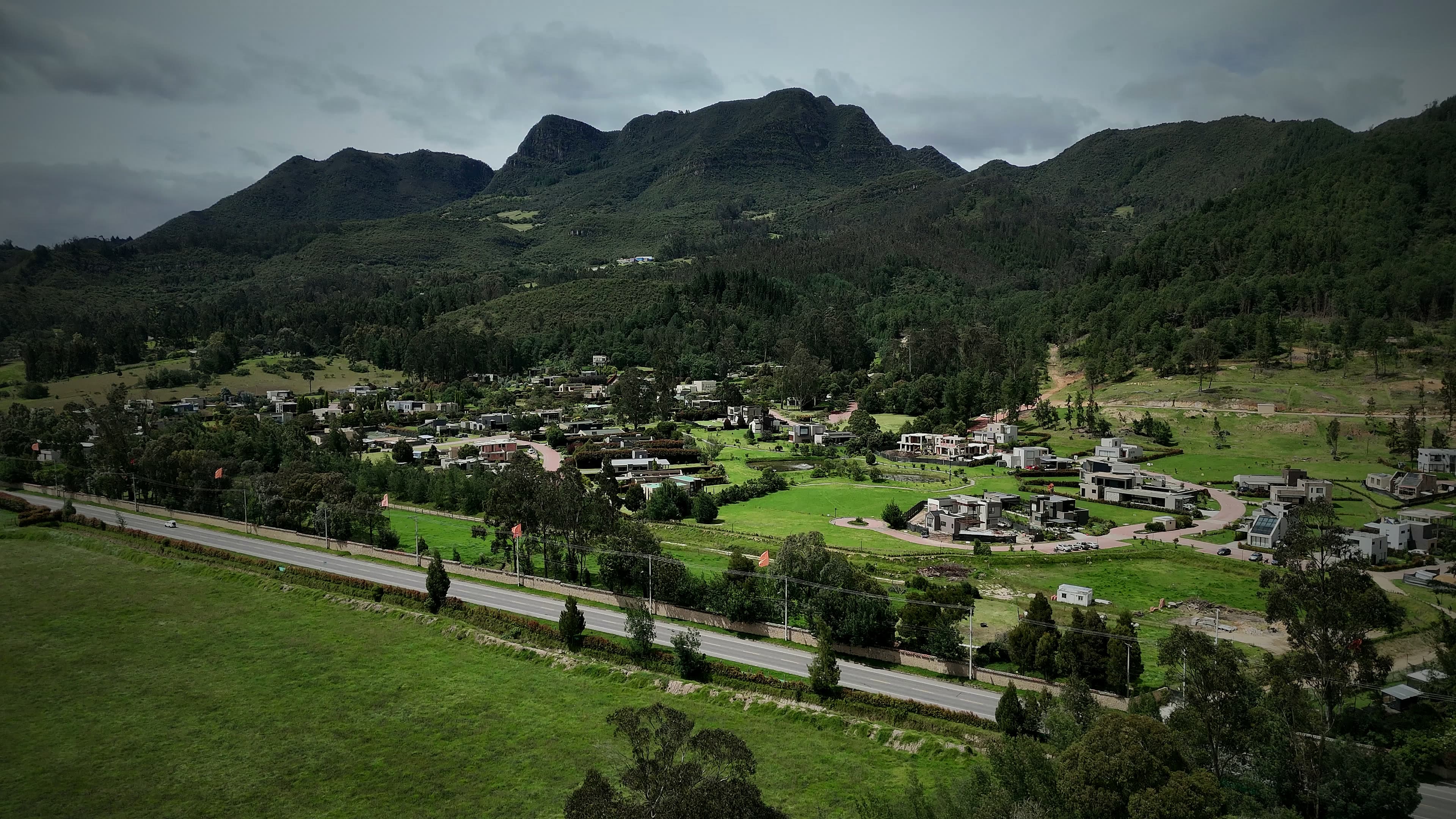 Aerial view of modern country homes among mountains in La Sabana de Bogotá
